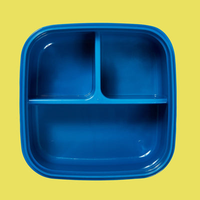inside of blue bento box showing dividers for three sections