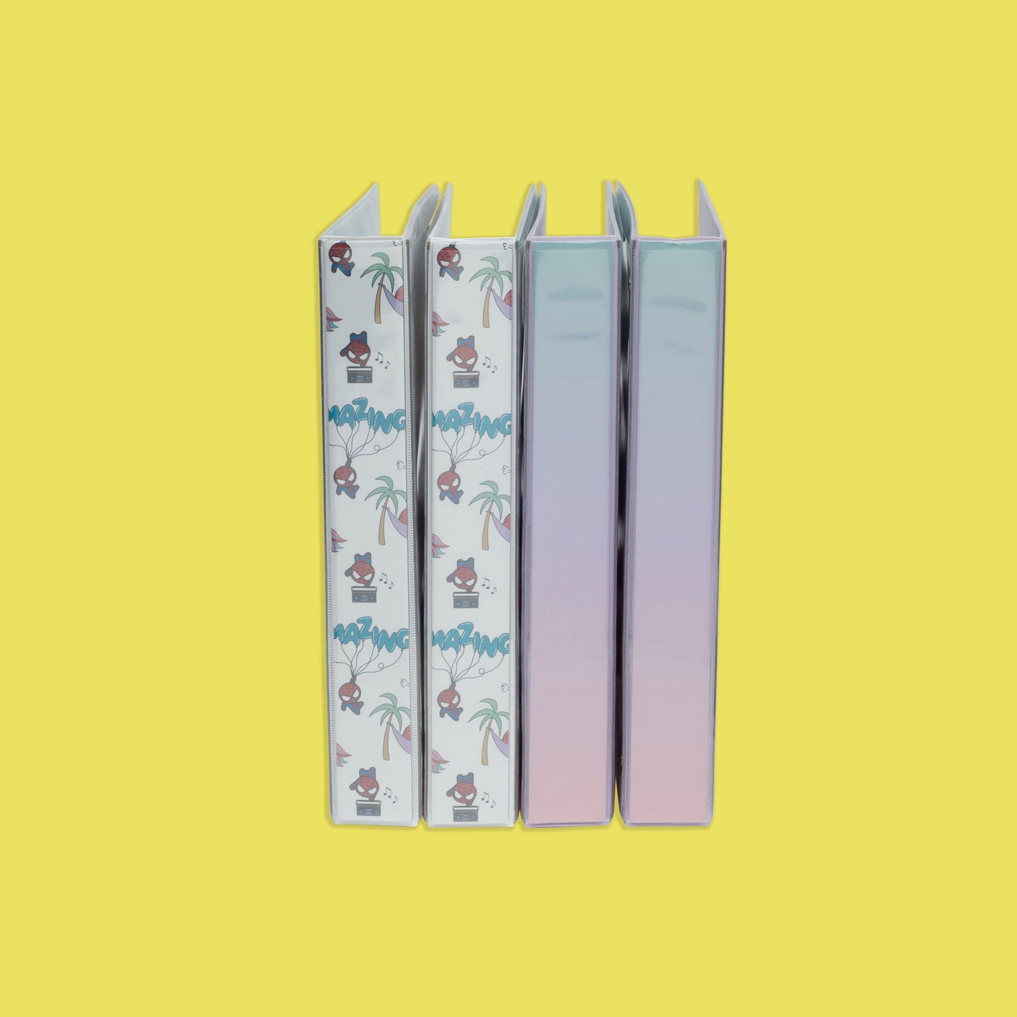 set of 4 Spider-Man 3-ring 1" binders - 2 floating Spider-Man binders and 2 unicorn Spider-Man binders