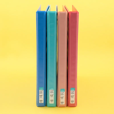 set of four half-inch 3-ring binders - blue. mint, blush and coral