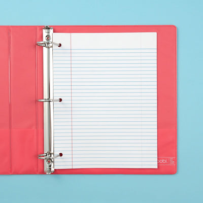 inside of open 3-ring binder with 3-hole punched college-ruled paper inside pocket and inside pockets on each side