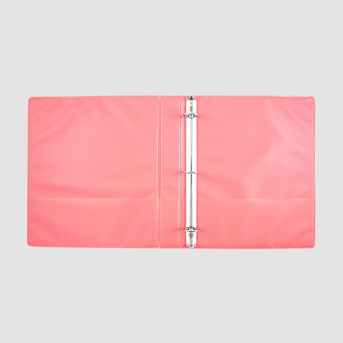inside of open coral ombre 3-ring 1" binder showing inside pockets on both sides and D-ring detail