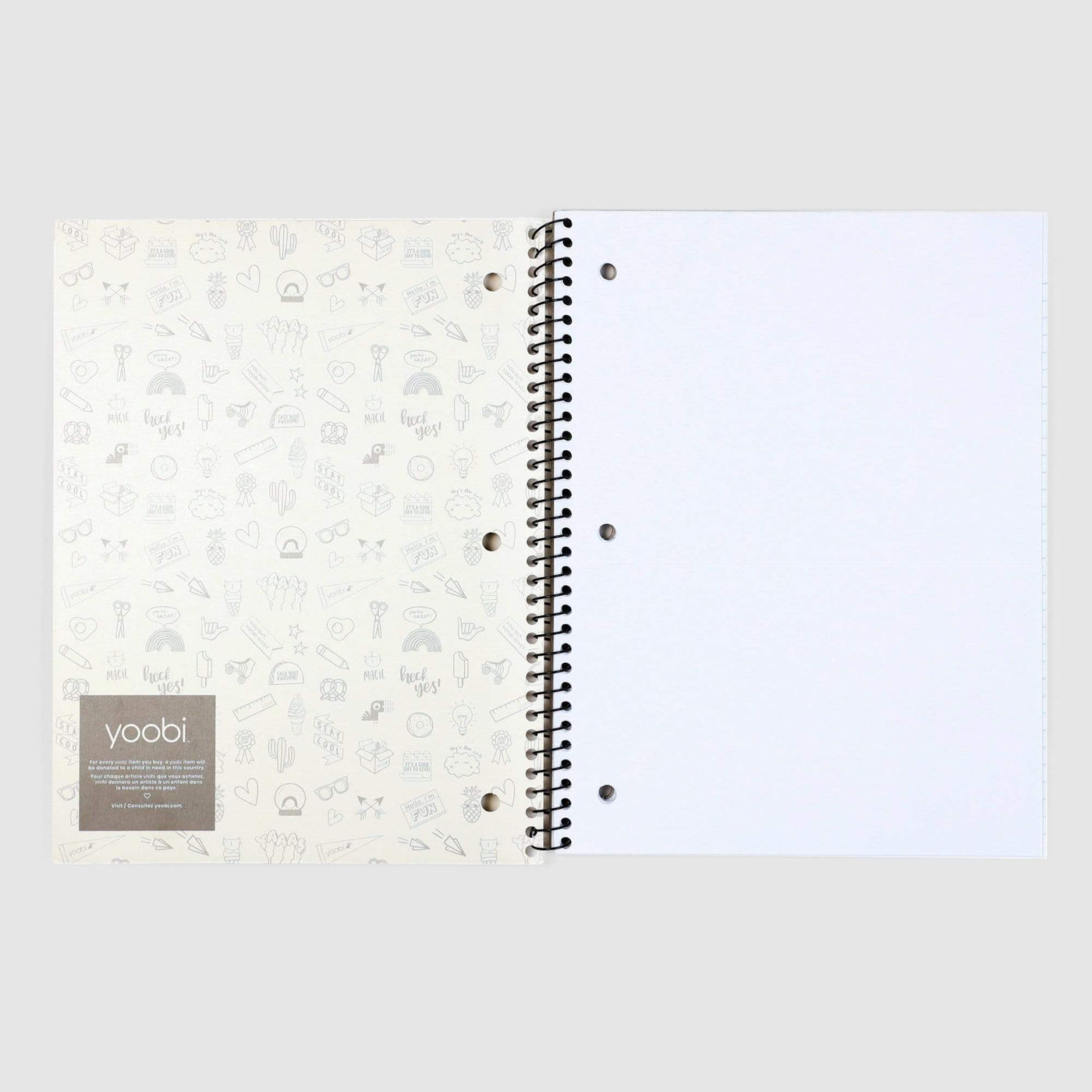 inside of open one subject spiral notebook with 3-hole punch and college-ruled paper