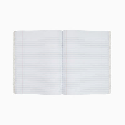 Inside of open composition book showing college rule lined paper