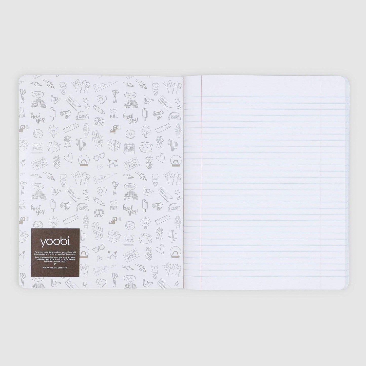 inside of open composition book showing college-ruled paper