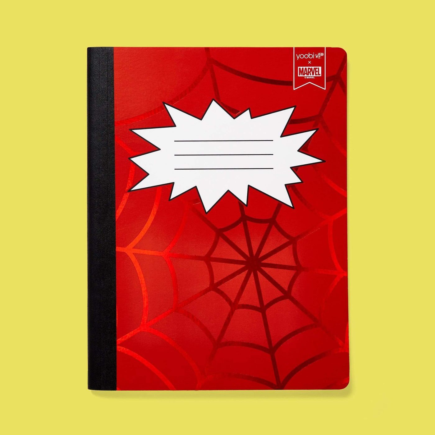 red composition book with red web print on cover