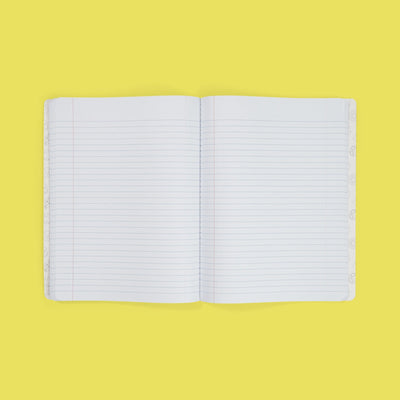 inside of open composition book showing college-ruled paper