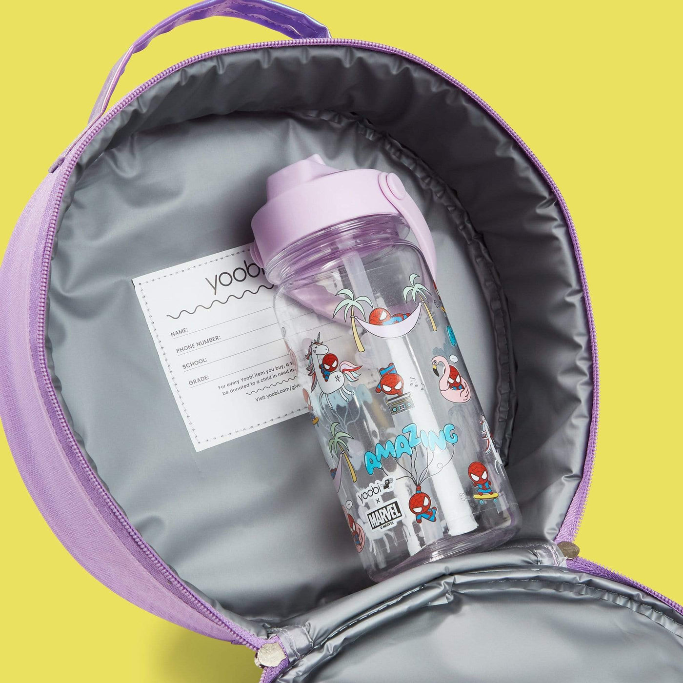 inside of open unicorn Spider-Man lunch bag showing water bottle inside.  Inside lining is grey