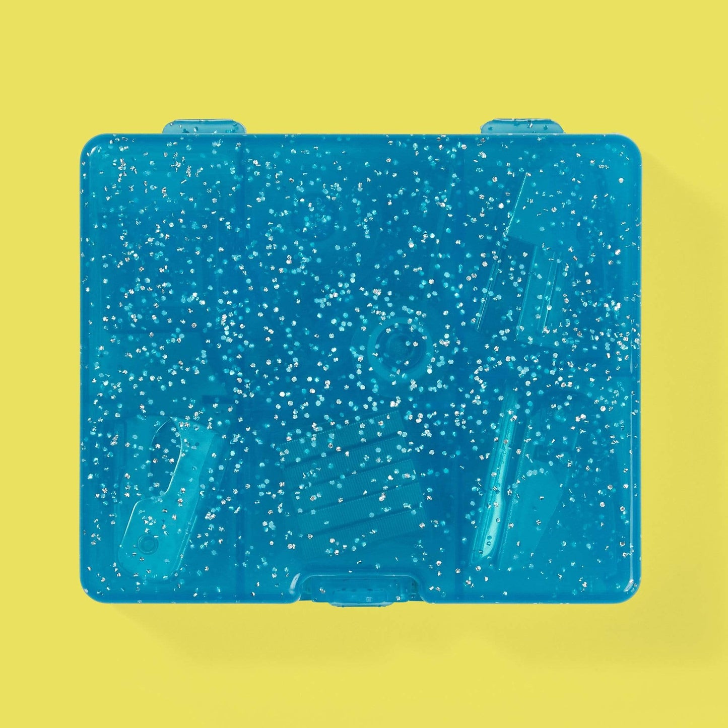 bottom of Captain America mini supply kit case, blue glitter