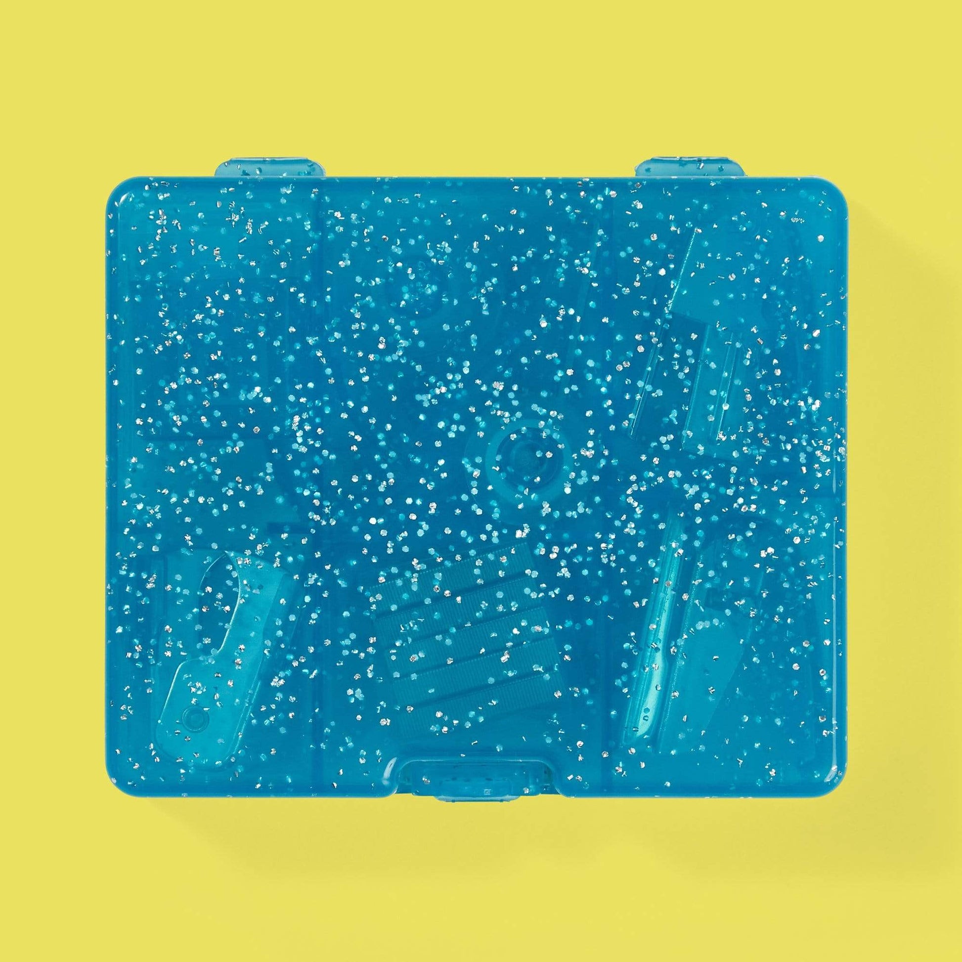 bottom of Captain America mini supply kit case, blue glitter